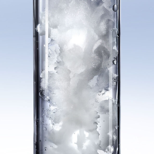Pure Ritual Care-in-Foam dense and airy texture captured in a laboratory glass tube.